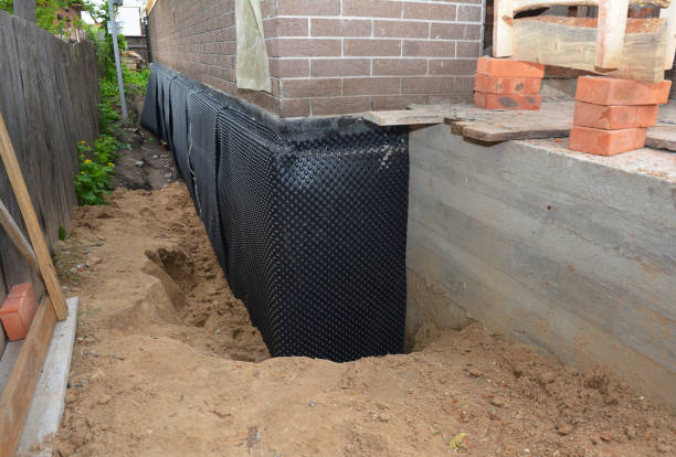 SJ Waterproofing Pros technician performing targeted Sump Pump Installation assessment in California, KY